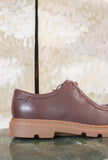 Stringata Junction di Camper realizzata in pregiata pelle tonalità Brown da Uomo
