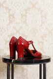 Dècolleté wante di chie mihara con t-strap nell'esclusiva colorway red passion