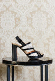 Sandalo opentoe con plateau in intreccio vienna black and white ss24 by chie mihara