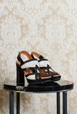 Sandalo opentoe con plateau in intreccio vienna black and white ss24 by chie mihara