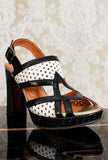 Sandalo opentoe con plateau in intreccio vienna black and white ss24 by chie mihara