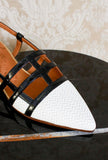 Slingback con tacco a rocchetto di chie mihara nella colorway optical black white ss24