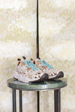 Sneakers Wave Woman di Flower Mountain realizzata in un raffinato mix di suede, nylon e pony hair nel sofisticato abbinamento Milk, Black e Brown da Donna
