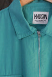 Polo con Zip di Madson Km 0 realizzata in levantina di cotone in tonalità Verdissimo da Uomo