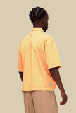 Polo con Zip di Madson Km 0 realizzata in levantina di cotone nella tonalità Camomilla da uomo