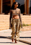 Pantalone Gianni firmato Mes Demoiselles Paris realizzato in viscosa nella luminosa fantasia Golden Garden da Donna