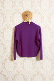 Maglia polo in cashmere color fucsia violet della maison niù fashion