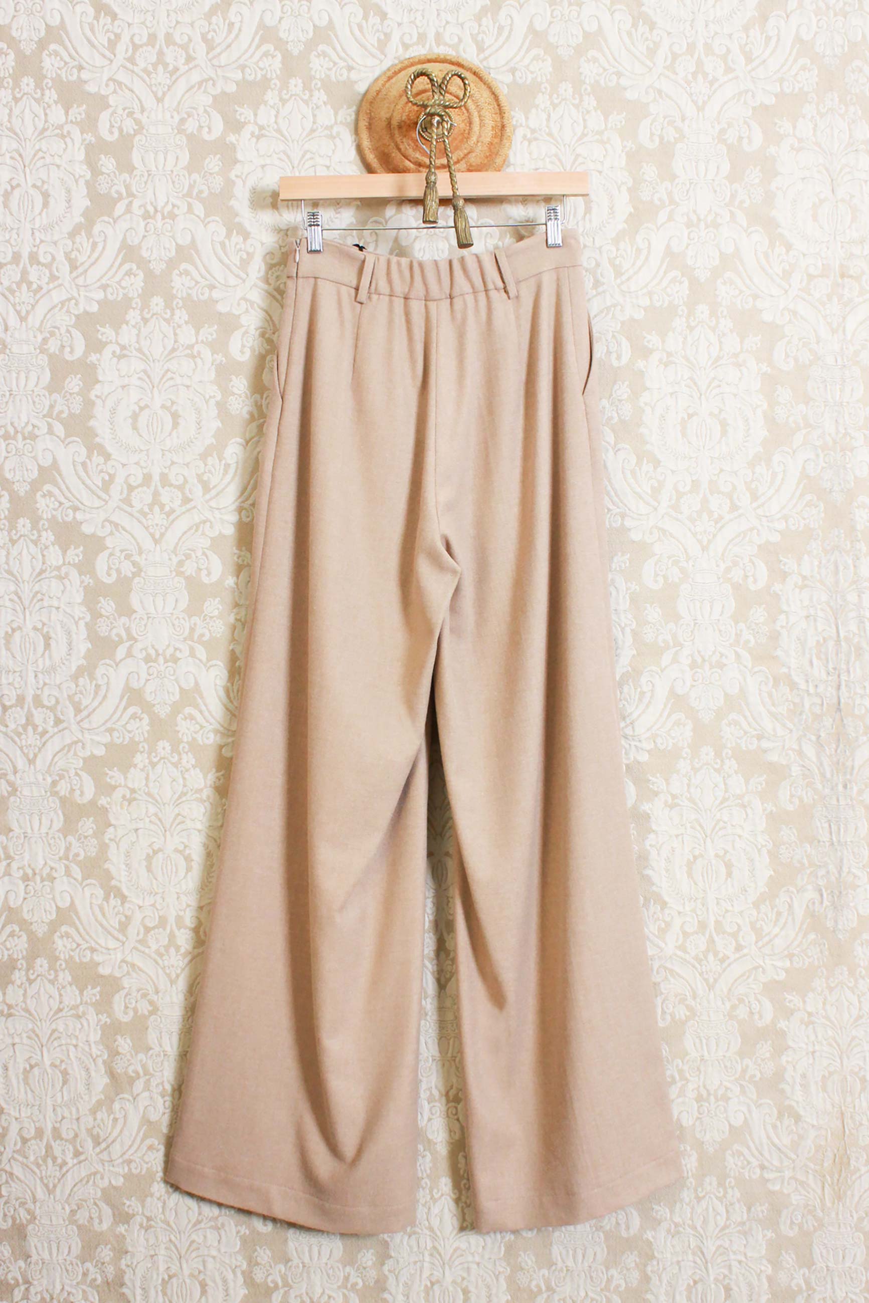 Pantalone a campana in lana della maison niù fashion color beige paja