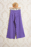 Pantalone da donna cropped anni 70 della maison niù in jacquard violet