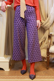 Pantalone da donna cropped anni 70 della maison niù in jacquard violet