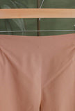 Pantalone Bojan di Niù viene reinterpretato nella calda tonalità Rumah da Donna