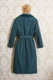 Capospalla modello Trench lungo imbottito da donna dellla maison Niù nel color verde selva
