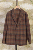 Blazer Miles di Original Vintage Style realizzato in morbida lana vergine nell’iconico motivo Tartan Check Moro