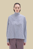 Camicia Reversibile di Phisique du Role interpreta l'eleganza contemporanea con raffinata semplicità realizzata in cotone nella delicata nuance White da Donna