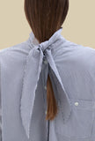 Camicia Reversibile di Phisique du Role interpreta l'eleganza contemporanea con raffinata semplicità realizzata in cotone nella delicata nuance White da Donna