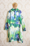 Poncho antipioggia di rainkiss con 10 bottiglie di plastica riciclata fantasia lily rain