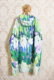 Poncho antipioggia di rainkiss con 10 bottiglie di plastica riciclata fantasia lily rain