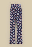 Pantalone Fluid con Baschina in Jersey di Niù, nell’inedita fantasia Biru abstract flowers, coniuga fluidità e fascino contemporaneo