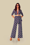 Pantalone Fluid con Baschina in Jersey di Niù, nell’inedita fantasia Biru abstract flowers, coniuga fluidità e fascino contemporaneo