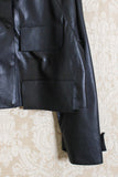 giubbino cropped in pelle nera della maison tela9 da donna ss24