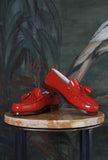 Mocassino cambrigde da donna con nappina di the sharp corner in pelle abrasivata color corallo